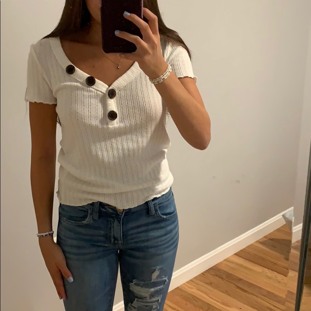 White top with buttons